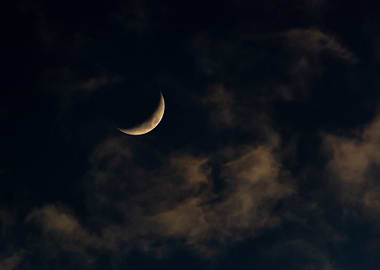 Crescent Moon in Night Sky