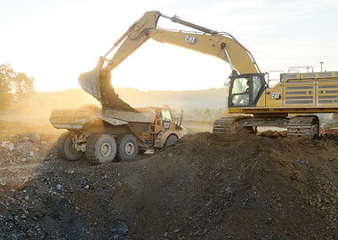 Caterpillar Excavator Loading Dump Truck