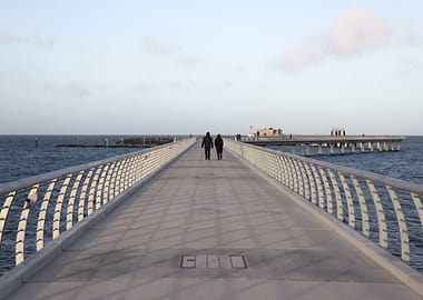 Couple Walking on Pier