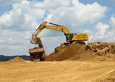 Caterpillar 374 Excavator Loading Dump Truck