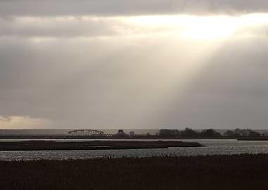 Bridge Under Cloudy Sky