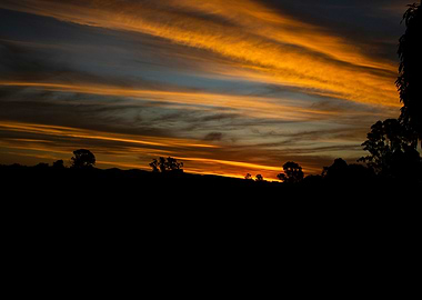 Fiery Horizon – A Dramatic Sunset Over the Australian Landscape