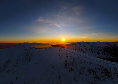 Sunset Over Snowy Mountain peak Chopock