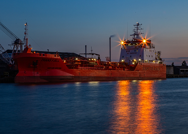 Red Cargo Ship at Dusk