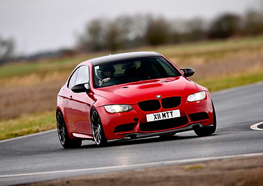 Red BMW M3 on Track