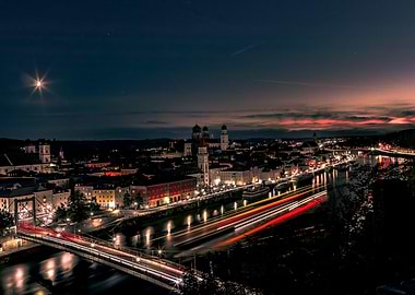 Cityscape at night with colorful light streaks