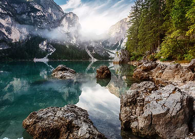 Incredible Nature Landscape. Braies Lake in Dolomites mountains with morning fo