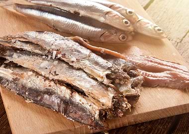 Salted Anchovies on Wooden Board