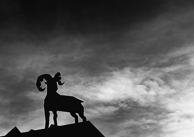 Ram Silhouette Against Cloudy Sky