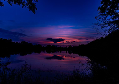 Silhouetted Lake Sunset