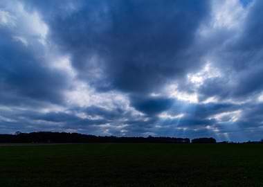 Sun Rays Through Clouds