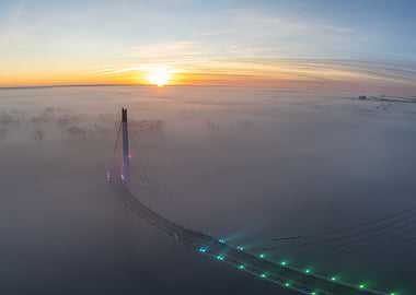 Bridge in Fog at Sunrise