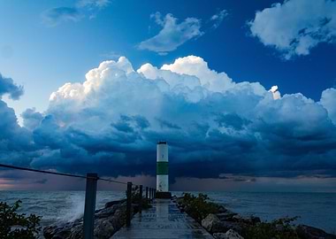 Lighthouse Under Storm Clouds