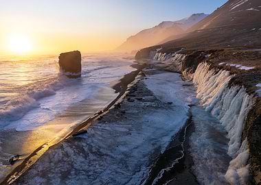 Frozen Waterfall Sunset in Iceland