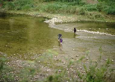 People Crossing River