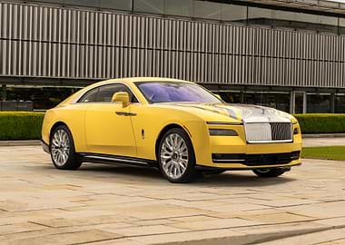 Yellow Rolls Royce Coupe