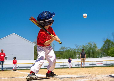 Young Baseball Player Batting