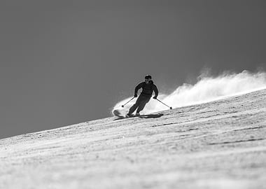 Skier Carving Through Powder
