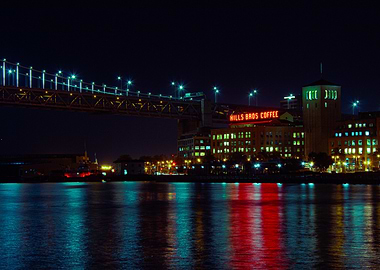 Night View of Bay Bridge and Hills Bro Coffee Building