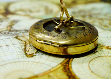 Antique Compass on Map