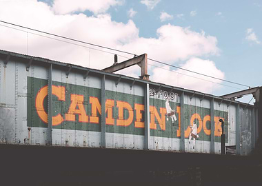 London, England I Camden Town industrial bridge to the vibrant urban atmosphere of famous district to the retro vintage aesthetic architecture of urban street cityscape letters mural street art