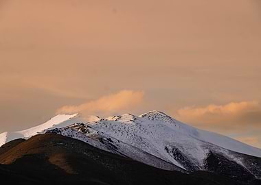 Snowy Mountain Peaks at Sunset