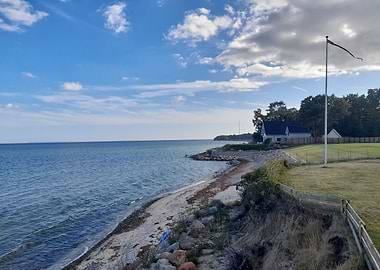 Coastal House with Blue Sky
