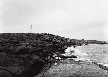Lighthouse on Rocky Coast