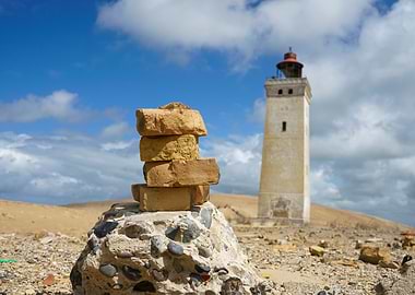 Lighthouse and Stone Stack (Rubjerg Knude Fyr on the Danish coast of Rubjerg Knude)