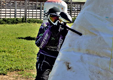 Paintball Player Taking Cover