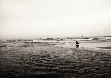 Solitary Figure on the Shore
