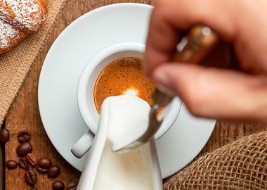 Pouring Milk into Espresso