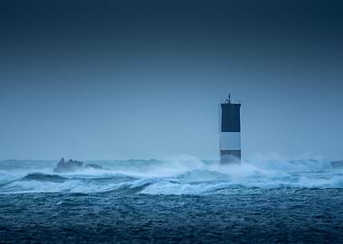 Lighthouse in Stormy Sea