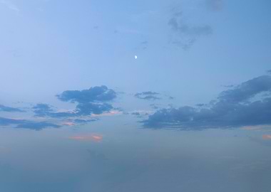 Blue Sky with Clouds and Moon