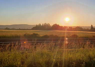 Sunrise Over Railroad Tracks