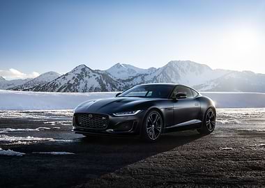 Black Jaguar F-Type Coupe in Snowy Mountains