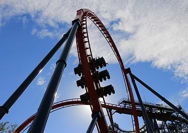 Roller Coaster Against Blue Sky