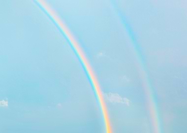 Double Rainbow in Light Blue Sky