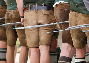 Tradition in Focus: Bavarian Men in Lederhosen at the Maypole Celebration