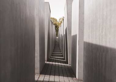 Berlin, Germany I Minimalist black and white perspective of Memorial to the Murdered Jews of Europe with strong architectural geometry, moody columns and solemn atmosphere in a powerful photography
