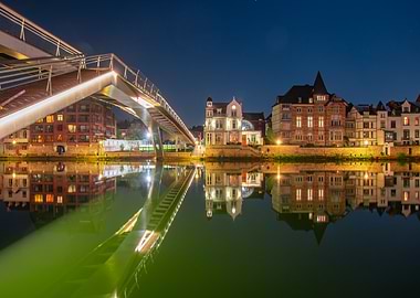 Modern Bridge and Cityscape at Night