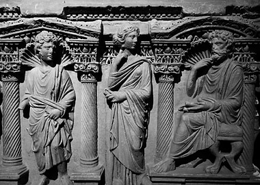 Ancient Stone Relief of Three Figures
