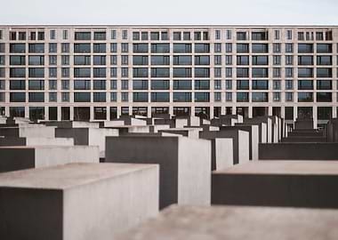 Berlin, Germany I Memorial to the Murdered Jews of Europe in urban city panorama with dark geometric lines and modern soviet architecture photography in a minimalist and powerful berliner perspective