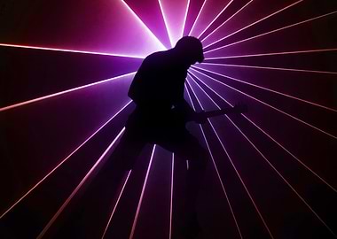 Silhouette Guitarist with Laser Beam Backdrop