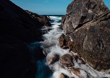 Rocky Coastline with Flowing Water in France