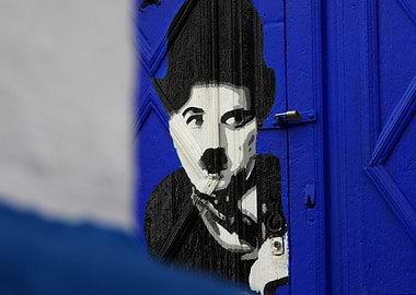 Charlie Chaplin Graffiti on Blue Door
