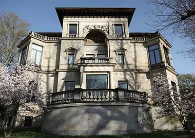 Elegant Stone Mansion with Balconies