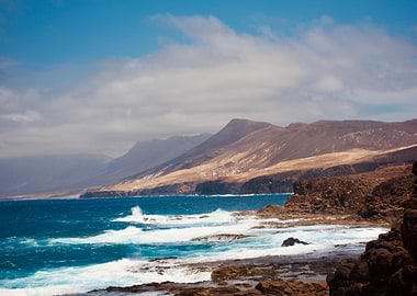 Coastal Landscape with Mountains and Waves
