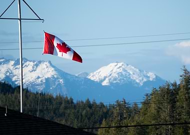 Canadian Flag with Mountain Backdrop