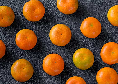Tangerines on Dark Textured Background